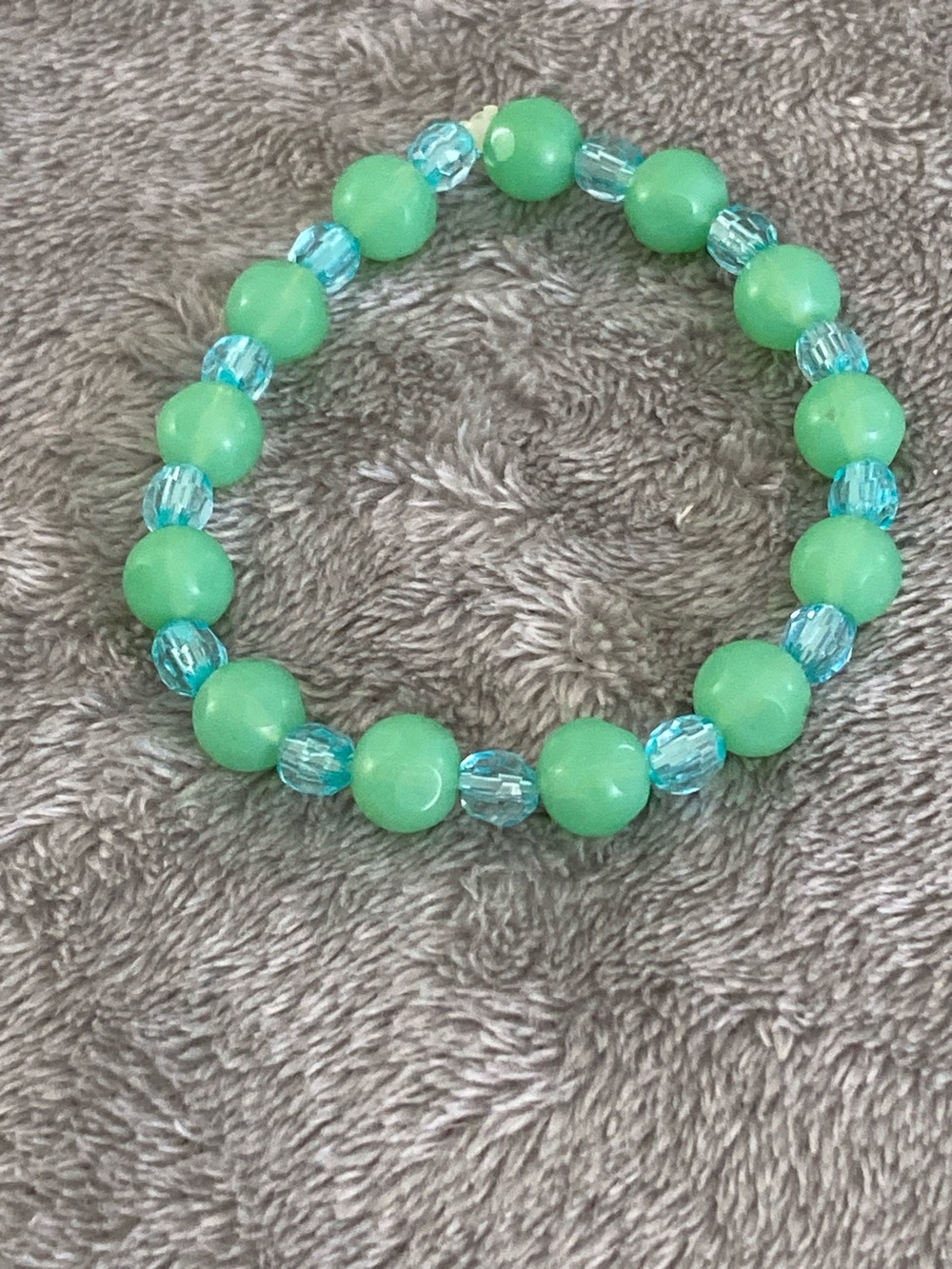 Light blue and glow green beaded bracelet
